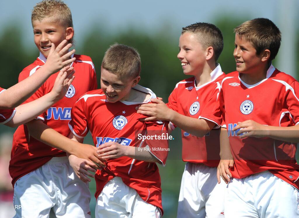 7 June 2008; Lee Delaney, second from left, celebrates scoring the third goal for Shelbourne FC with his team-mates, l to r, Lloyd Buckley, Jason Caffrey and Regan Donelon during the Danone Nations Cup National Final. Shelbourne FC, Dublin, v Willow Park, Athlone, Co. Westmeath. AUL Complex, Clonshaugh, Dublin. Picture credit: Ray McManus / SPORTSFILE