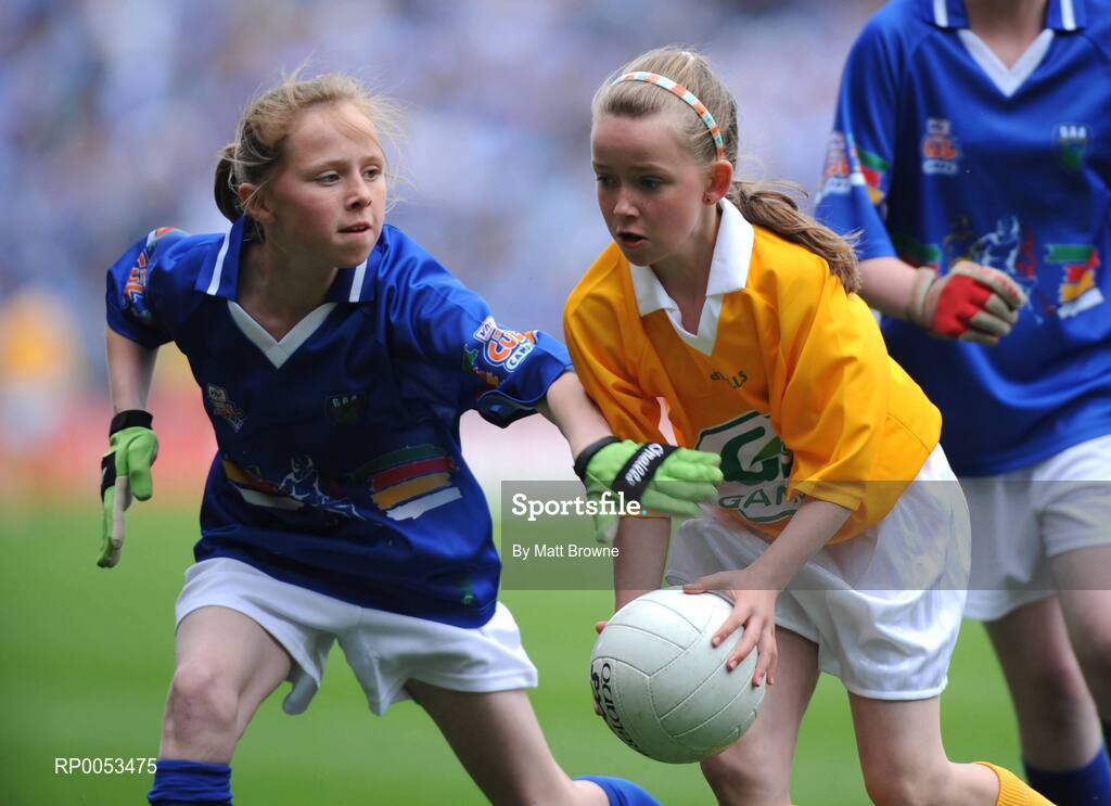 8 June 2008; Aoife Mulholland, Tenure NS, Co. Louth ain action against Kelly Garbutt, Donaghmede, pictured participating in the Vhi Cúl Camps game played at half time during the GAA Football Leinster Senior Championship Quarter-Final, Louth v Dublin, Croke Park, Dublin. Picture credit: Matt Browne / SPORTSFILE