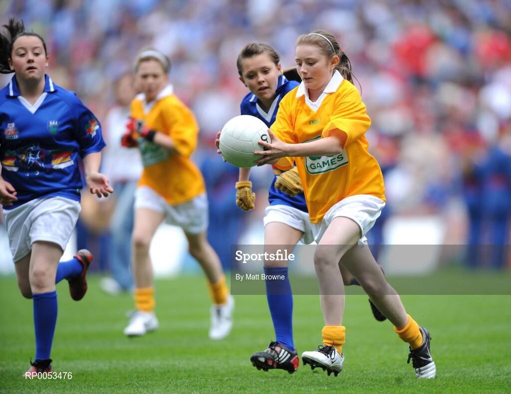 8 June 2008; Shannon Madden, St. Malachy's GNS, Co. Louth, in action against Shannon Cassin, left, and Jade Blake, Donaghmede, pictured participating in the Vhi Cúl Camps game played at half-time during the GAA Football Leinster Senior Championship Quarter-Final, Louth v Dublin, Croke Park, Dublin. Picture credit: Matt Browne / SPORTSFILE