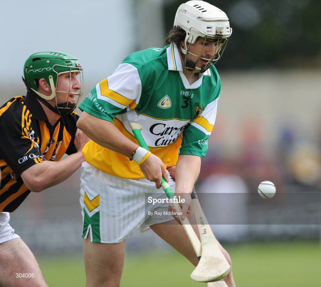 15 June 2008; David Kenny, Offaly, is blocked by Eoin Larkin, Kilkenny. GAA Hurling Leinster Senior Championship Semi-Final, Offaly v Kilkenny, O'Moore Park, Portlaoise, Co. Laois. Picture credit: Ray McManus / SPORTSFILE