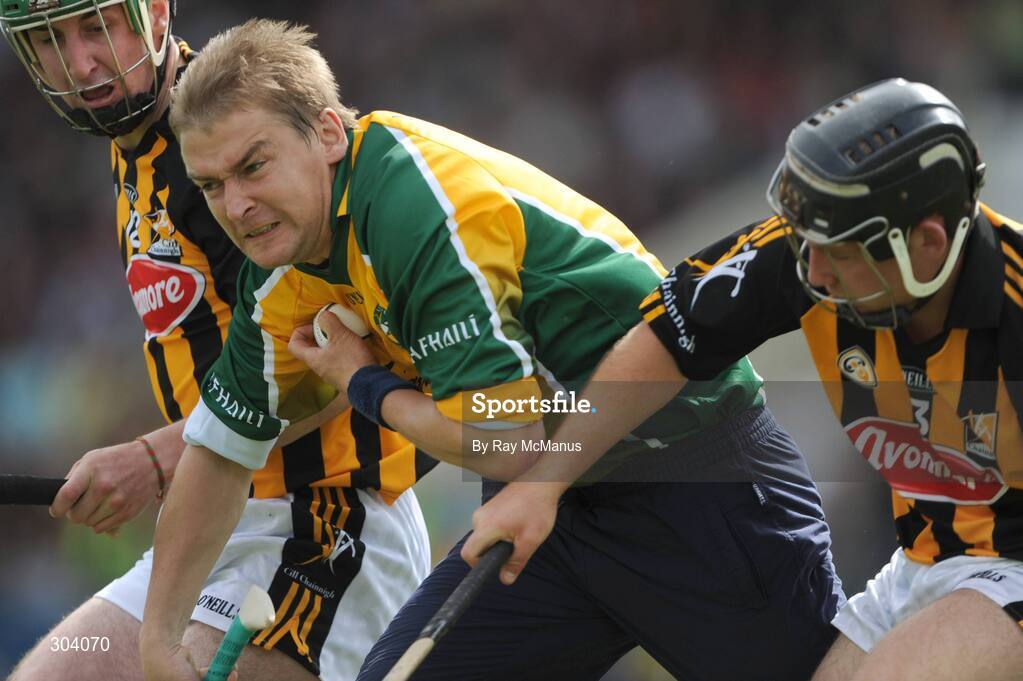 15 June 2008; The Offaly captain and goalkeeper Brian Mullins prepares to clear under pressure from Kilkenny forwards Eoin larkin, left, and Richie Hogan. GAA Hurling Leinster Senior Championship Semi-Final, Offaly v Kilkenny, O'Moore Park, Portlaoise, Co. Laois. Picture credit: Ray McManus / SPORTSFILE