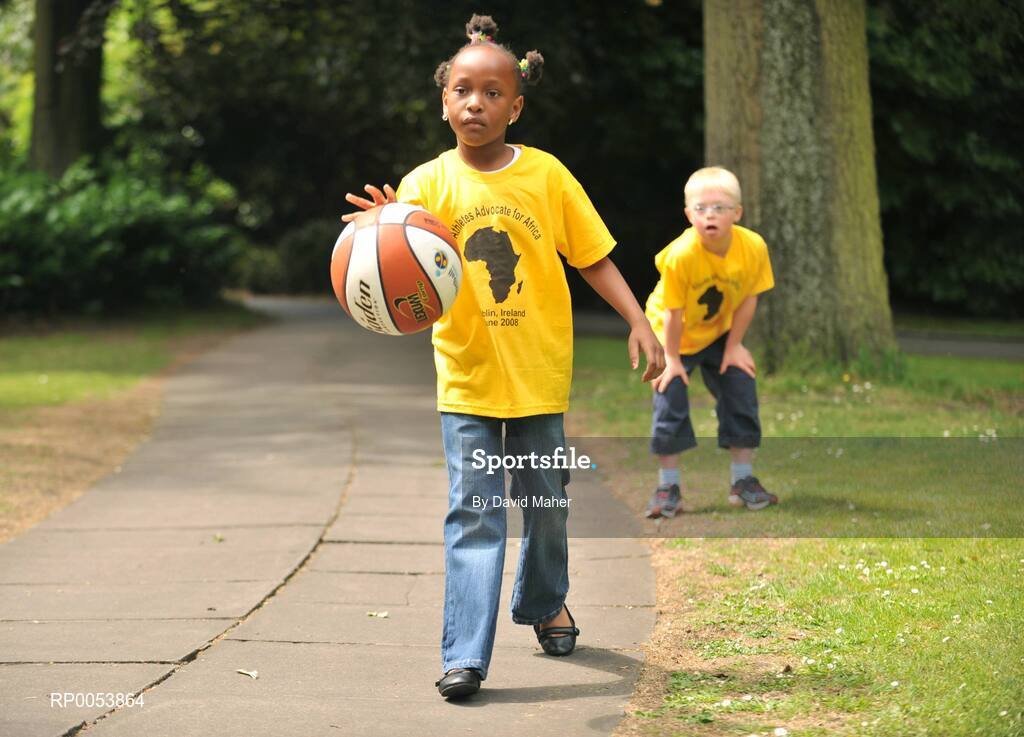 17 June 2008; At the launch of the Athletics Advocate for Africa conference, to be hosted by Special Olympics Ireland from 22-26 June in Dublin are seven-year-old Blessing Nduka, from Clonee, Co. Meath, and Special Olympics Athlete Andrew McCarthy, from Foxrock, Dublin. St. Stephen’s Green, Dublin. Picture credit: David Maher / SPORTSFILE
