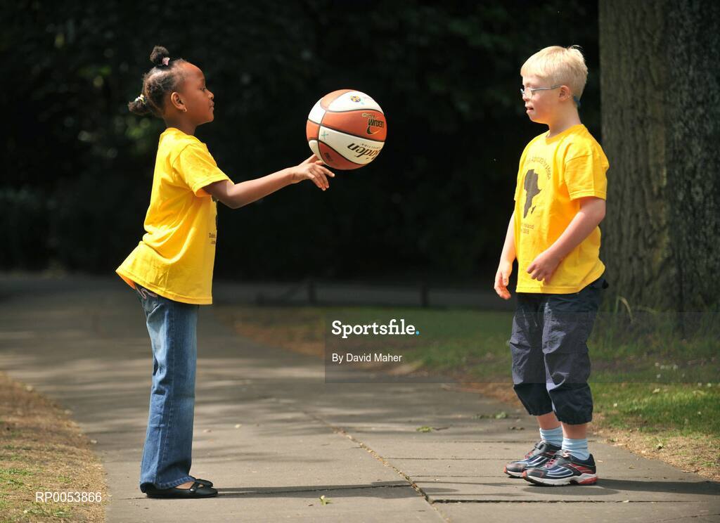 17 June 2008; At the launch of the Athletics Advocate for Africa conference, to be hosted by Special Olympics Ireland from 22-26 June in Dublin are seven-year-old Blessing Nduka, from Clonee, Co. Meath, and Special Olympics Athlete Andrew McCarthy, from Foxrock, Dublin. St. Stephen’s Green, Dublin. Picture credit: David Maher / SPORTSFILE