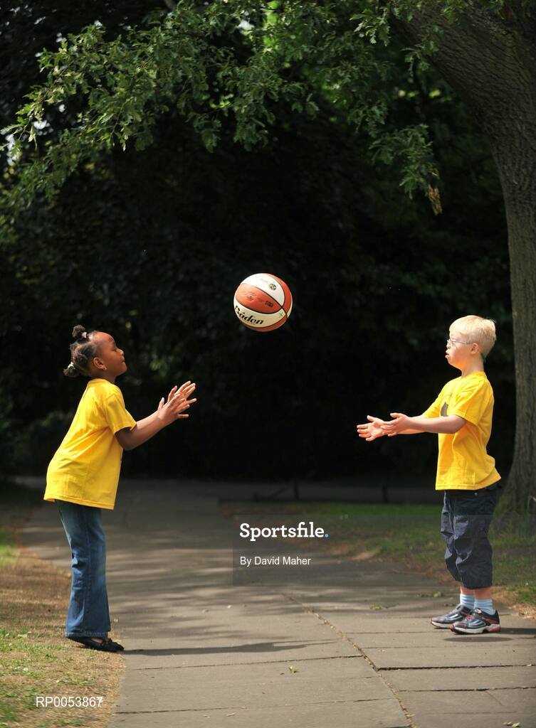 17 June 2008; At the launch of the Athletics Advocate for Africa conference, to be hosted by Special Olympics Ireland from 22-26 June in Dublin are seven-year-old Blessing Nduka, from Clonee, Co. Meath, and Special Olympics Athlete Andrew McCarthy, from Foxrock, Dublin. St. Stephen’s Green, Dublin. Picture credit: David Maher / SPORTSFILE