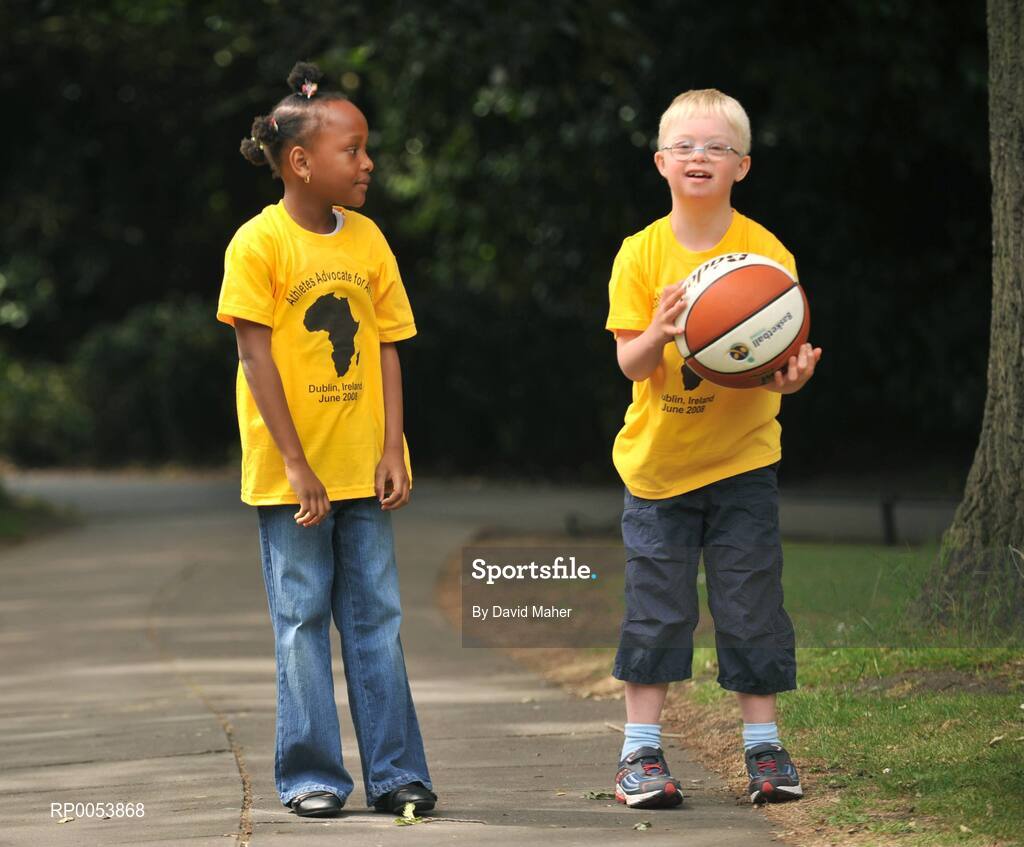 17 June 2008; At the launch of the Athletics Advocate for Africa conference, to be hosted by Special Olympics Ireland from 22-26 June in Dublin are seven-year-old Blessing Nduka, from Clonee, Co. Meath, and Special Olympics Athlete Andrew McCarthy, from Foxrock, Dublin. St. Stephen’s Green, Dublin. Picture credit: David Maher / SPORTSFILE