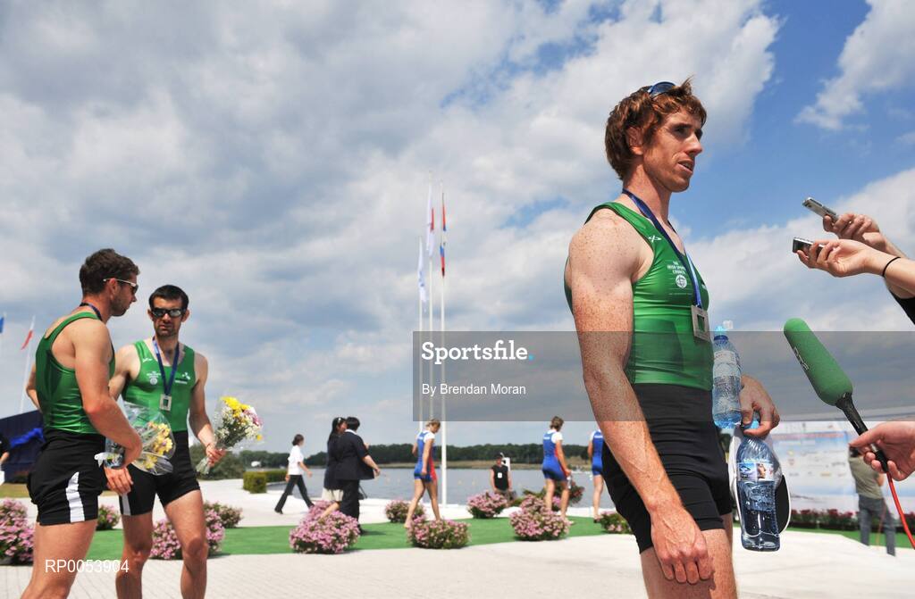 18 June 2008; Member of the Ireland Lightweight Men's Four Cathal Moynihan, right, speaks to the media as team-mates Paul Griffin and Gearoid Towey look on after finished second in their Final behind Germany in a time of 6:06.34 and qualifying for the Olympic Games in Beijing in August. 2008 Final Olympic Rowing Qualification Regatta, Poznan, Poland. Picture credit: Brendan Moran / SPORTSFILE
