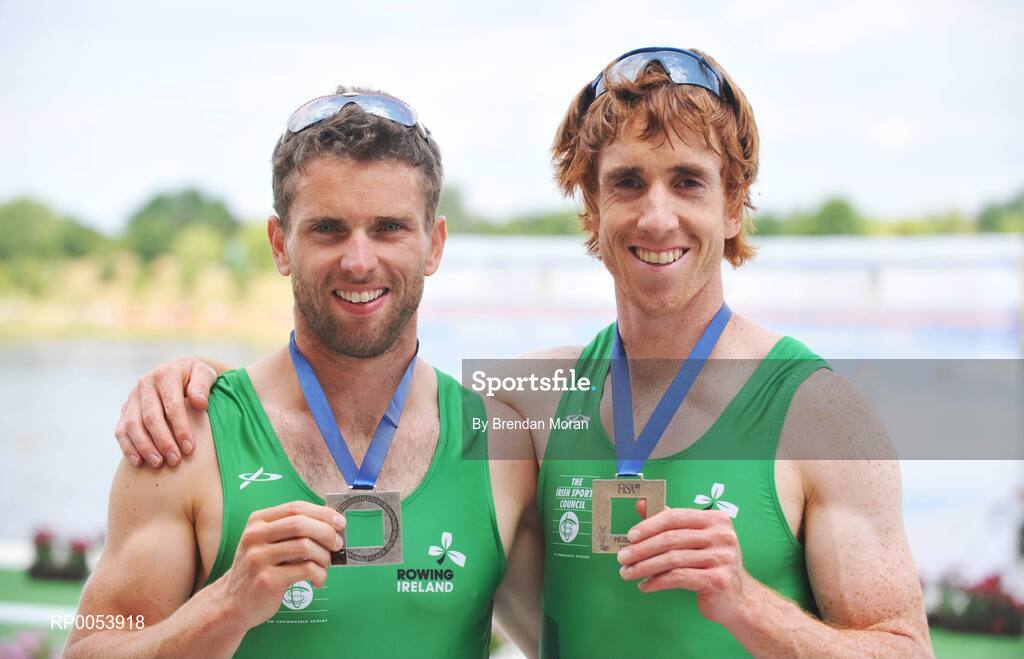 18 June 2008; Killarney men Paul Griffin, left, and Cathal Moynihan celebrate with their silver medals after finishing second in their Final behind Germany in a time of 6:06.34 and qualifying for the Olympic Games in Beijing in August. 2008 Final Olympic Rowing Qualification Regatta, Poznan, Poland. Picture credit: Brendan Moran / SPORTSFILE