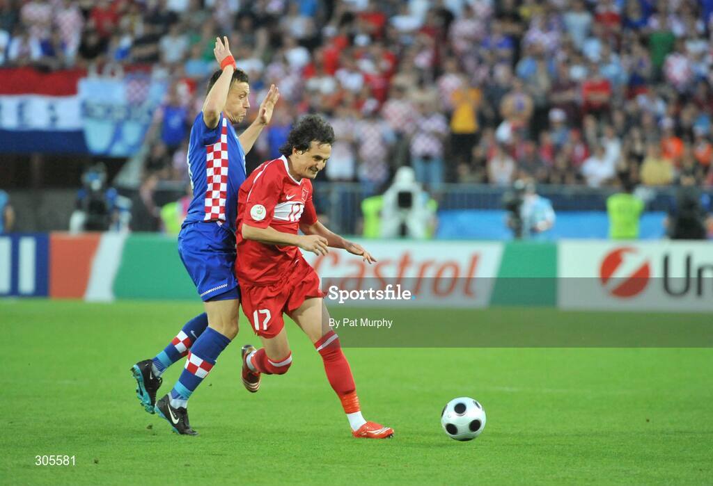 20 June 2008; Tuncay Sanli, Turkey, in action against Ivica Olic, Croatia. UEFA EURO 2008TM, Quarter-Final, Croatia v Turkey, Ernst Happel Stadion, Vienna, Austria. Picture credit; Pat Murphy / SPORTSFILE