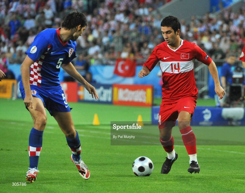 20 June 2008; Arda Turan, Turkey, in action against Vedran Corluka, Croatia. UEFA EURO 2008TM, Quarter-Final, Croatia v Turkey, Ernst Happel Stadion, Vienna, Austria. Picture credit; Pat Murphy / SPORTSFILE