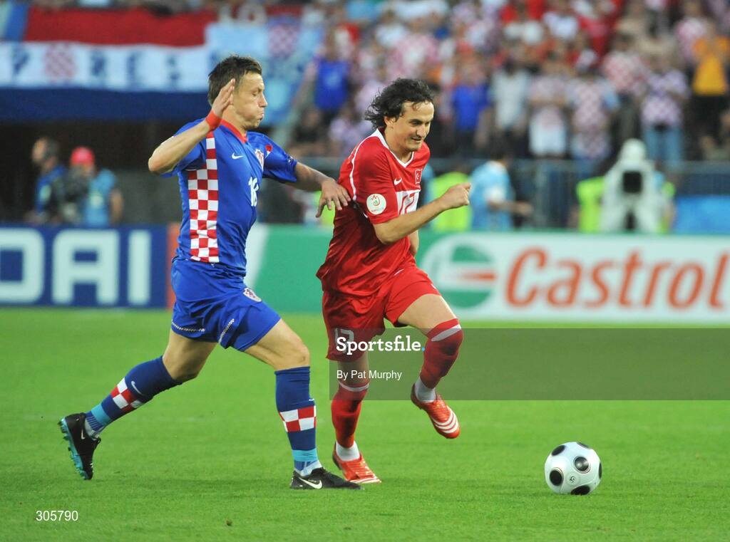 20 June 2008; Tuncay Sanli, Turkey, in action against Ivica Olic, Croatia. UEFA EURO 2008TM, Quarter-Final, Croatia v Turkey, Ernst Happel Stadion, Vienna, Austria. Picture credit; Pat Murphy / SPORTSFILE