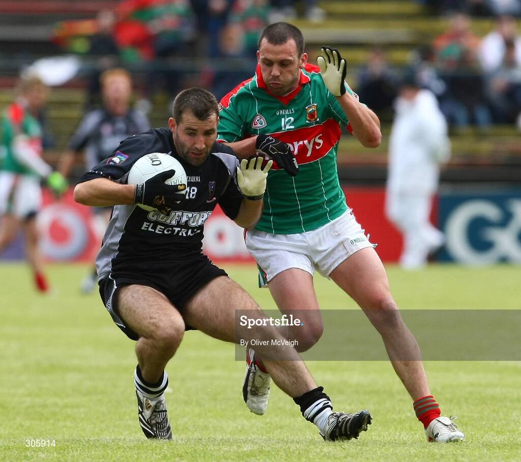 22 June 2008; Brendan Phillips, Sligo, in action against Trevor Mortimer, Mayo. GAA Football Connacht Senior Championship Semi-Final, Mayo v Sligo, McHale Park, Castlebar, Co. Mayo. Picture credit: Oliver McVeigh / SPORTSFILE
