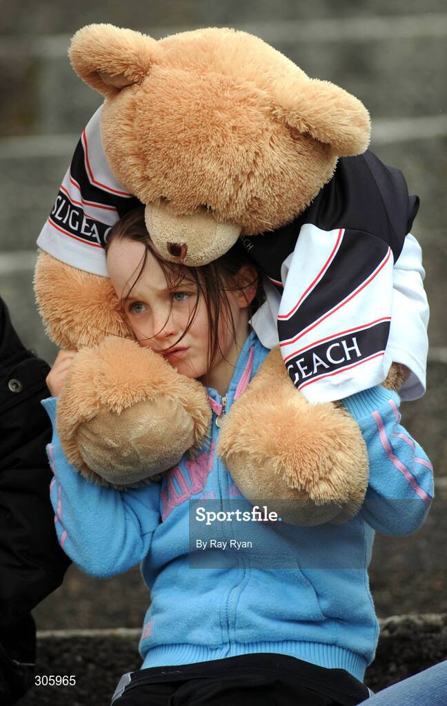 22 June 2008; Seven year old Chloe McKim, from Coolanley, Co. Sligo, watches the match with her teddy bear. GAA Football Connacht Senior Championship Semi-Final, Mayo v Sligo, McHale Park, Castlebar, Co. Mayo. Picture credit: Ray Ryan / SPORTSFILE