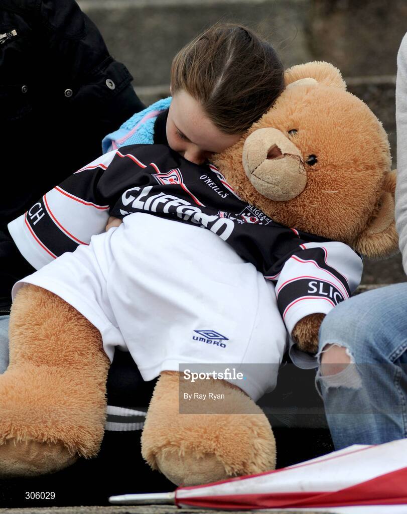 22 June 2008; Seven year old Chloe McKim, from Coolanley, Co. Sligo, watches the match with her teddy bear. GAA Football Connacht Senior Championship Semi-Final, Mayo v Sligo, McHale Park, Castlebar, Co. Mayo. Picture credit: Ray Ryan / SPORTSFILE