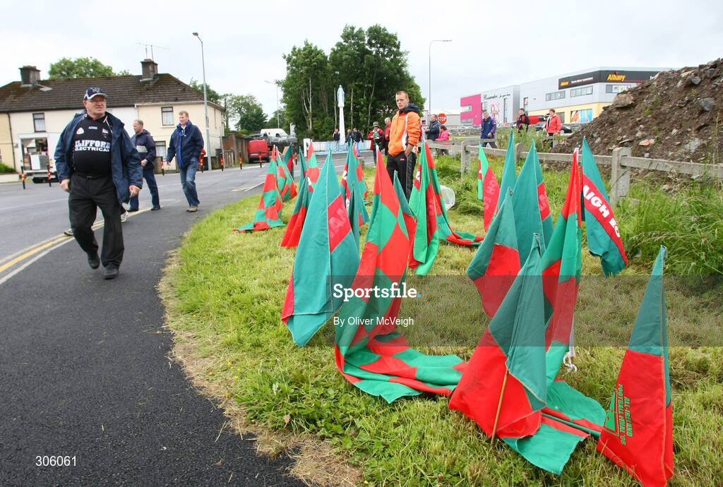 22 June 2008; A Sligo supporter passes by a Mayo flag seller outside McHale park. GAA Football Connacht Senior Championship Semi-Final, Mayo v Sligo, McHale Park, Castlebar, Co. Mayo. Picture credit: Oliver McVeigh / SPORTSFILE