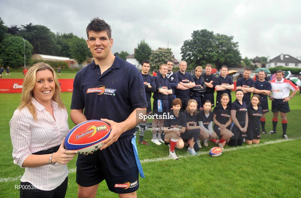 19 June 2008: Lana Condron, Budweiser, and Donncha O’Callaghan before he closed off his season in unusual fashion when he lined out with his own IRFU select 7 tag team at the Budweiser Tag League in Old Belvedere RFC in Dublin. In a game referred by World Cup Final referee, Alain Rolland, far right, Sutton based tag team, The Burbarians, won the chance to play opposite the Munster lock as part of the Budweiser Tag Rugby "Challenge Donncha" promotion. The Donncha O’Callaghan Select 7, back row, from left, Eoin Toolin, Conor Malone, James Stafford, Marcus O'Dwyer, Brian Green, Dave Keane, Sid Carmody, John Moran, Eamonn Sayers. Front row, from left, Ruth Wood-Martin, Orla Delaney, Tracey Hadnett, Shirley Moloney, Carmel O'Dwyer and Sinead Bennett. Donncha O’Callaghan Select 7 v The Burbarians, Old Belvedere RFC, Anglesea Road, Dublin. Picture credit: Stephen McCarthy / SPORTSFILE