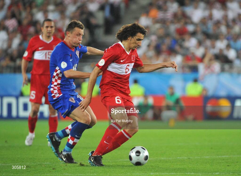20 June 2008; Mehmet Topal, Turkey, in action against Ivica Olic, Croatia. UEFA EURO 2008TM, Quarter-Final, Croatia v Turkey, Ernst Happel Stadion, Vienna, Austria. Picture credit; Pat Murphy / SPORTSFILE