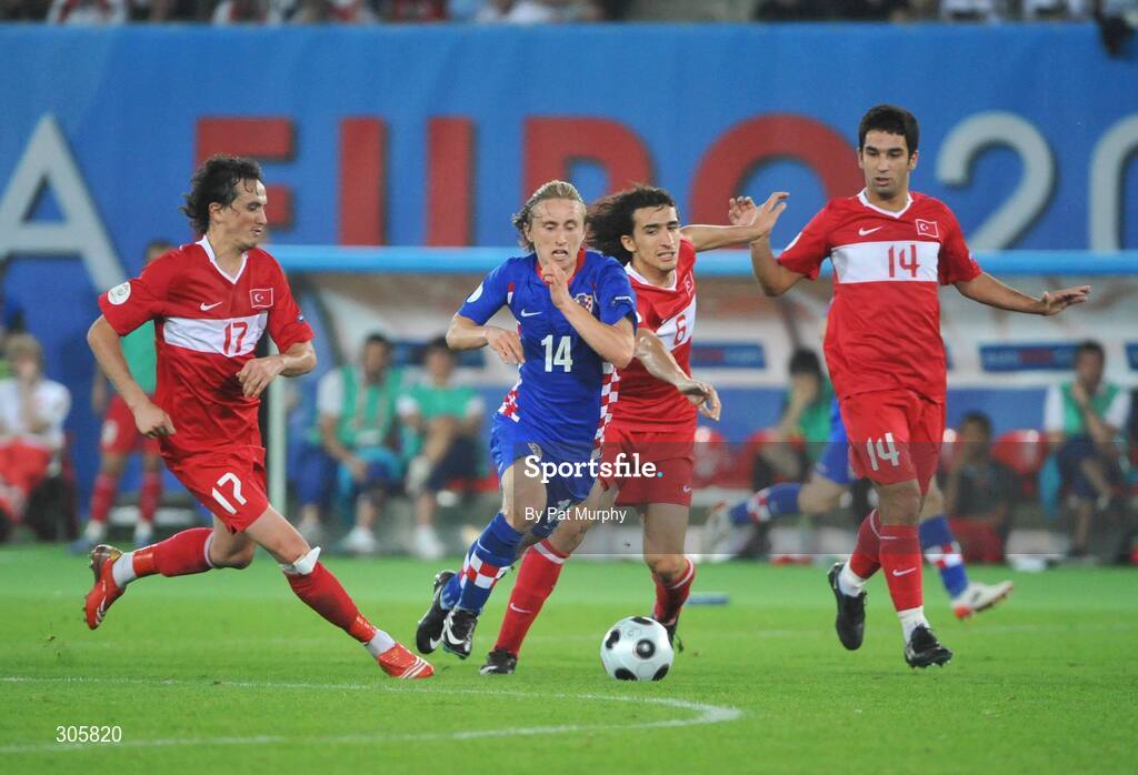 20 June 2008; Luka Modric, Croatia, in action against, from left, Tuncay Sanli, Mehmet Topal, and Arda Turan, Turkey. UEFA EURO 2008TM, Quarter-Final, Croatia v Turkey, Ernst Happel Stadion, Vienna, Austria. Picture credit; Pat Murphy / SPORTSFILE