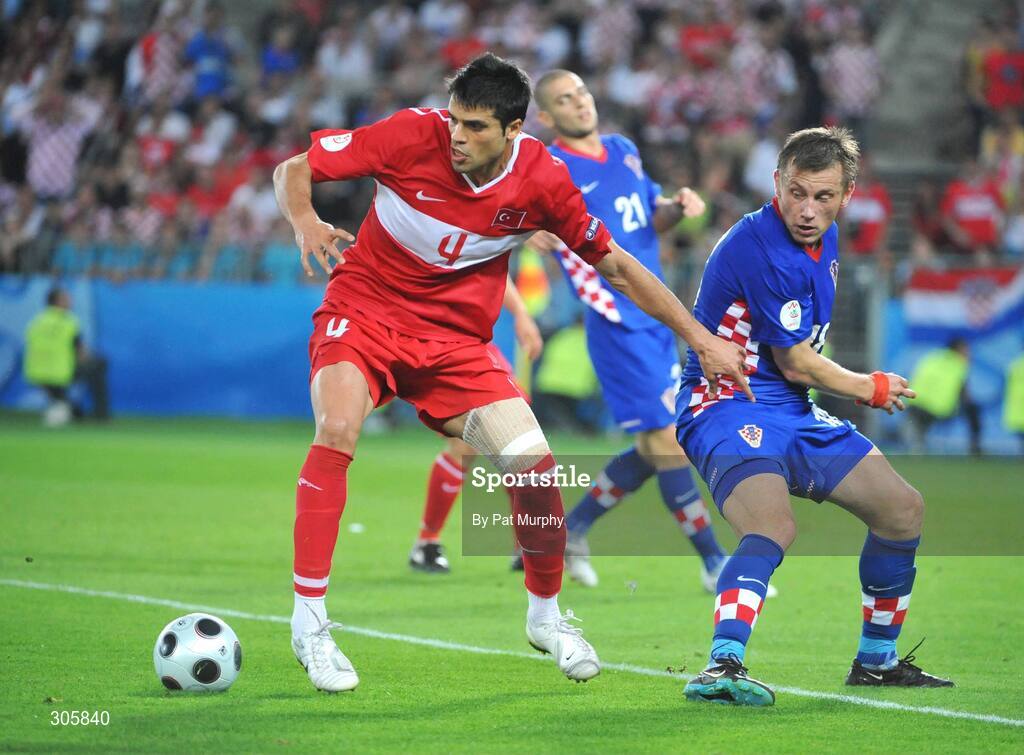 20 June 2008; Gokhan Zan, Turkey, in action against Ivica Olic, Croatia. UEFA EURO 2008TM, Quarter-Final, Croatia v Turkey, Ernst Happel Stadion, Vienna, Austria. Picture credit; Pat Murphy / SPORTSFILE