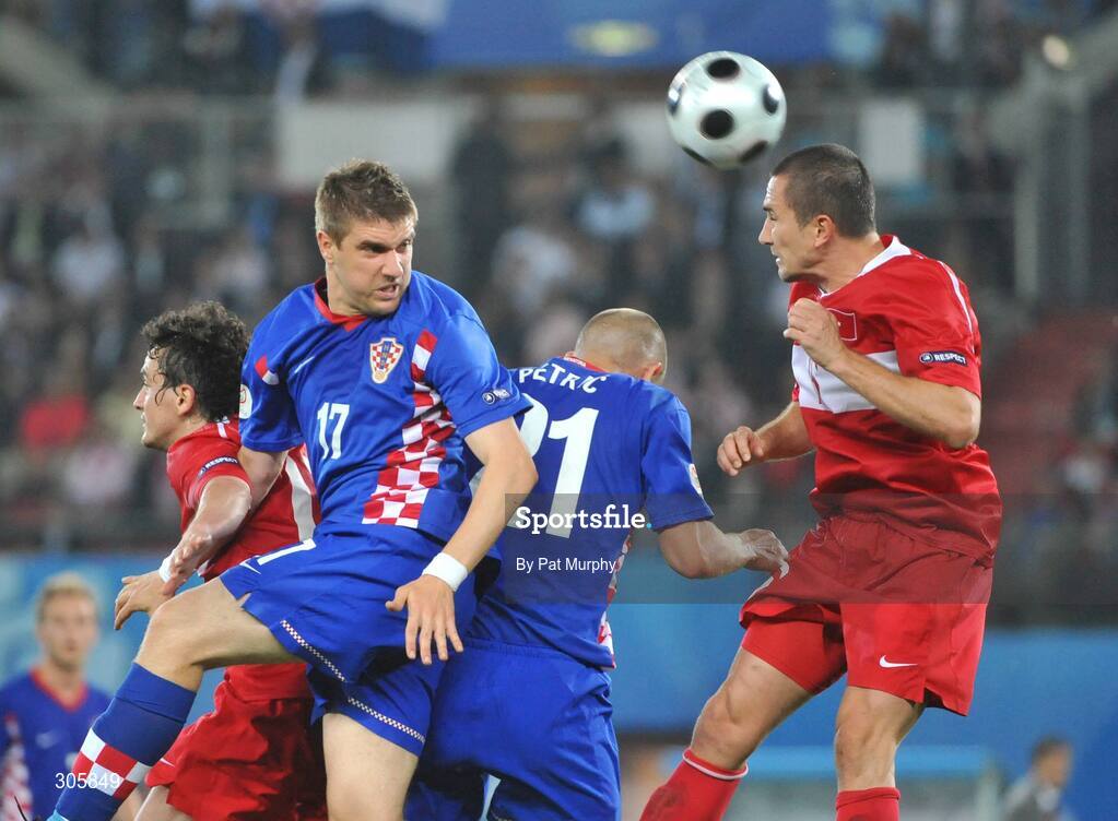20 June 2008; Turkeys Emre Asik, supported by team-mate Tuncay Sanli, left, wins the header against Croatias Ivan Klasnic, left, and Mladen Petric. UEFA EURO 2008TM, Quarter-Final, Croatia v Turkey, Ernst Happel Stadion, Vienna, Austria. Picture credit; Pat Murphy / SPORTSFILE