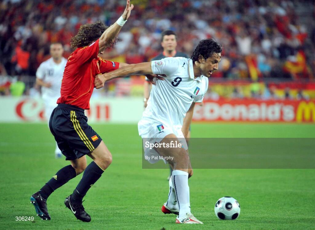 22 June 2008; Luca Toni, Italy, in action against Carles Puyol, Spain. UEFA EURO 2008TM, Quarter-Final, Spain v Italy, Ernst Happel Stadion, Vienna, Austria. Picture credit; Pat Murphy / SPORTSFILE