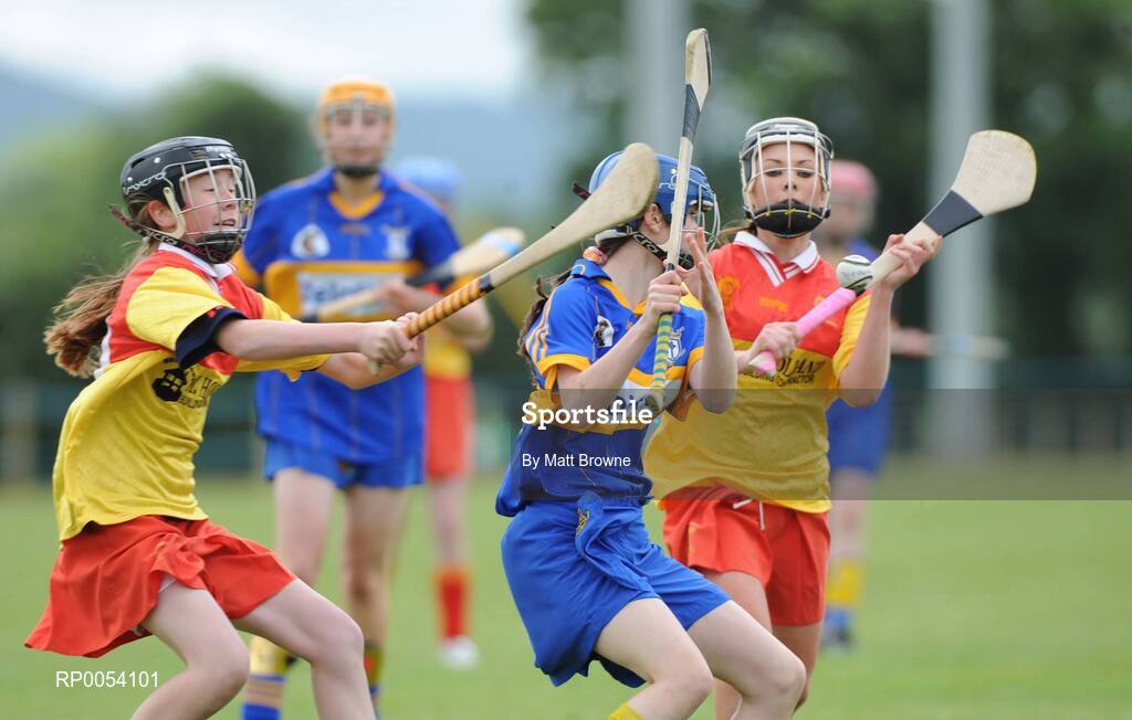 22 June 2008; Aoife McGoldrick, Ratoath, Co. Meath, in action against Orla Brennan, left, and Maria Fitzpatrick, The Harps, Co. Laois. Feile na nGael Camogie Finals, Division 3 Final, The Harps, Co. Laois v Ratoath, Co. Meath, Portlaoise GAA Club, Portlaoise, Laois. Picture credit: Matt Browne / SPORTSFILE