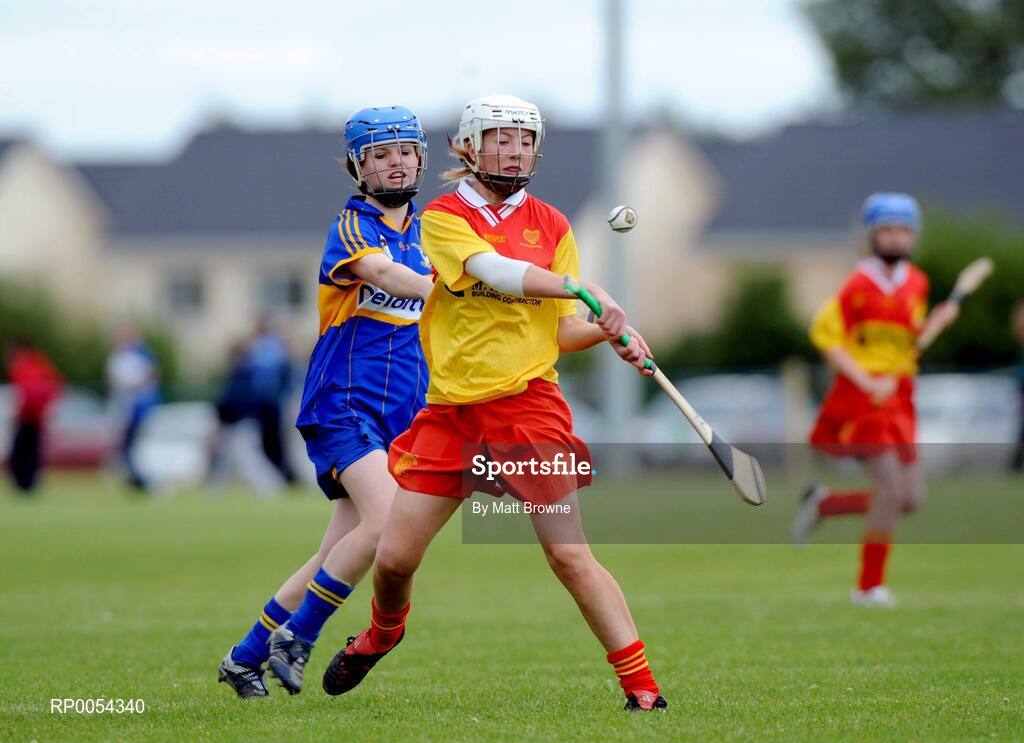22 June 2008; Rosemary Phelan, The Harps, Co. Laois, in action against Karen McCabe, Ratoath, Co. Meath. Feile na nGael Camogie Finals, Division 3 Final, The Harps, Co. Laois v Ratoath, Co. Meath, Portlaoise GAA Club, Portlaoise, Co. Laois. Picture credit: Matt Browne / SPORTSFILE