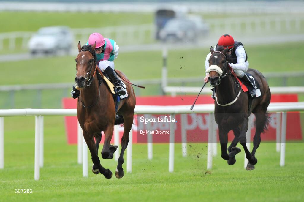 28 June 2008; Promising Lead, with Ryan Moore up, on their way to winning the Pretty Polly Stakes from second place Mad About You with Pat Smullen. Curragh Racecourse, Co. Kildare. Picture credit: Matt Browne / SPORTSFILE