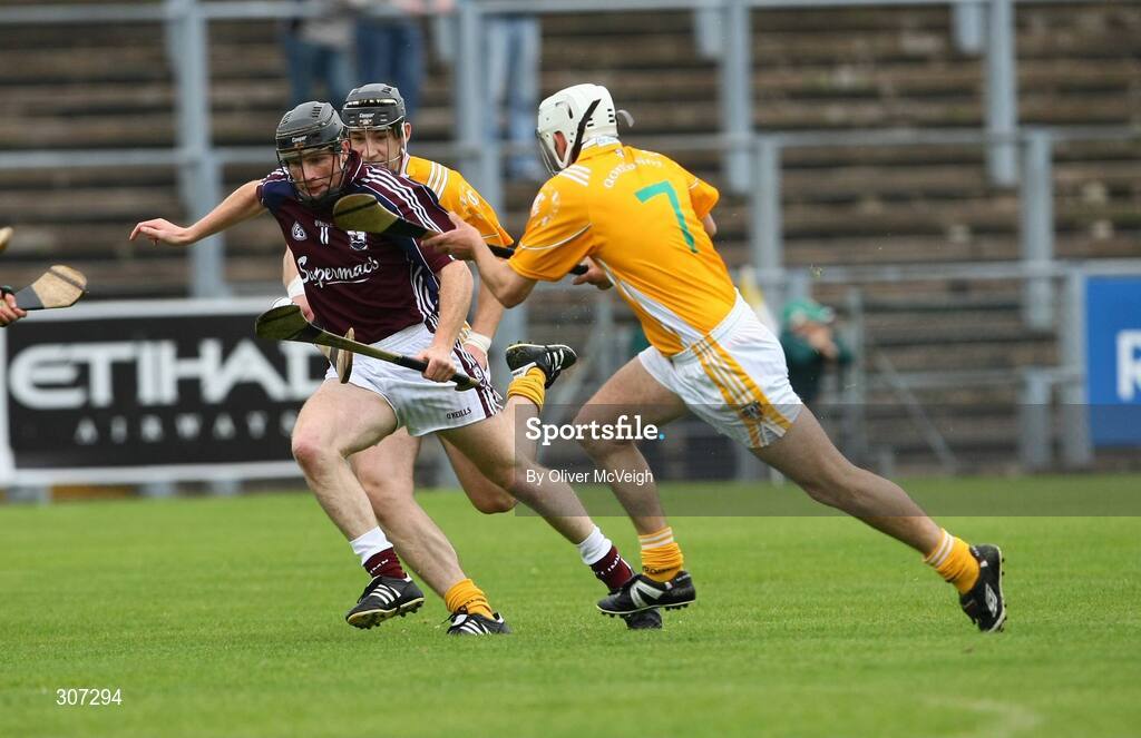 28 June 2008; Cyril Donnellan, Galway, in action against Johnny Campbell and Paul Shiels, Antrim. All-Ireland Senior Championship Qualifier, Round 1, Antrim v Galway, Casement Park, Belfast, Co. Antrim. Picture credit: Oliver McVeigh / SPORTSFILE