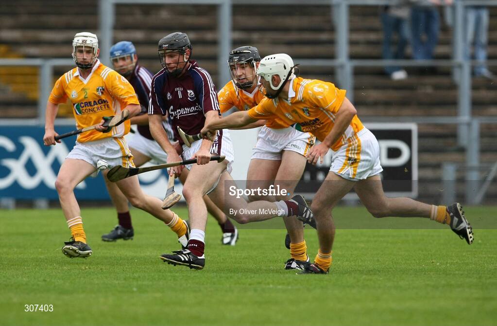 28 June 2008; Cyril Donnellan, Galway, in action against Cormac Donnelly and Johnny Campbell, Antrim. All-Ireland Senior Championship Qualifier, Round 1, Antrim v Galway, Casement Park, Belfast, Co. Antrim. Picture credit: Oliver McVeigh / SPORTSFILE
