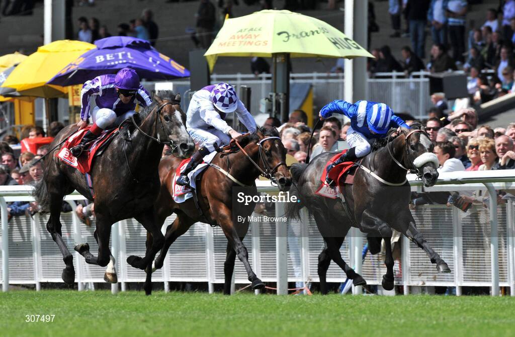 29 June 2008; Mastercraftsman, left, with Johnny Murtagh up, on their way to winning the One 51 Railway Stakes from second place Alhaban, right, with Declan McDonagh and third place Intense Focus, centre, with Kevin Manning. Curragh Racecourse, Co. Kildare. Picture credit: Maurice Doyle / SPORTSFILE