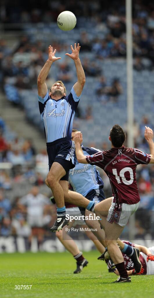 27 June 2008; Bryan Cullen, Dublin, wins possession ahead of Fergal Wilson, Westmeath. GAA Football Leinster Senior Championship Semi-Final, Dublin v Westmeath, Croke Park, Dublin. Picture credit: Ray McManus / SPORTSFILE