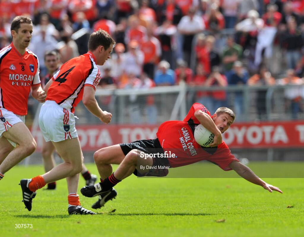 29 June 2008; Ronan Sexton, Down, in action against Finnian Moriarty, Armagh. GAA Football Ulster Senior Championship Semi-Final, Down v Armagh, St Tighearnach's Park, Clones, Co. Monaghan. Picture credit: David Maher / SPORTSFILE