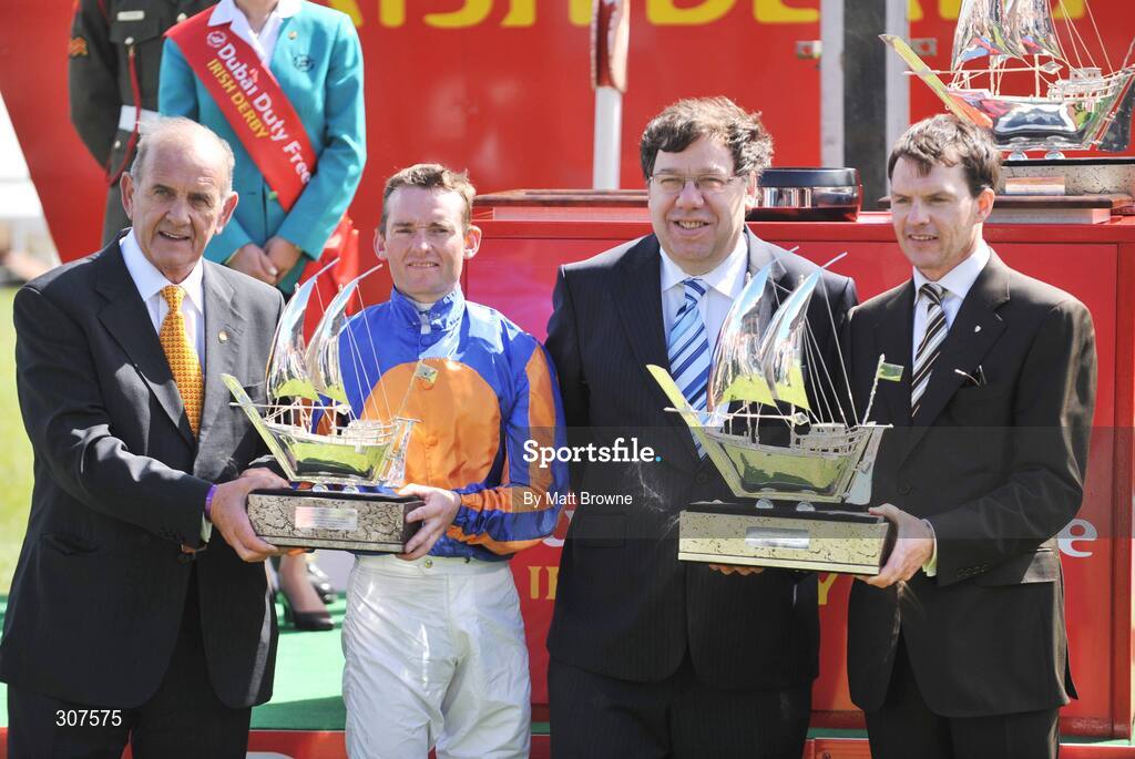 29 June 2008; Taoiseach, Mr. Brian Cowen TD, second from right, presents the winning trainer Aidan O'Brien with his trophy and Colm McLoughlin, Managing Director of Dubai Duty Free, presents the winning jockey Seamie Heffernan with his trophy after Frozen Fire won the Dubai Duty Free Irish Derby, Curragh Racecourse, Co. Kildare. Picture credit: Matt Browne / SPORTSFILE