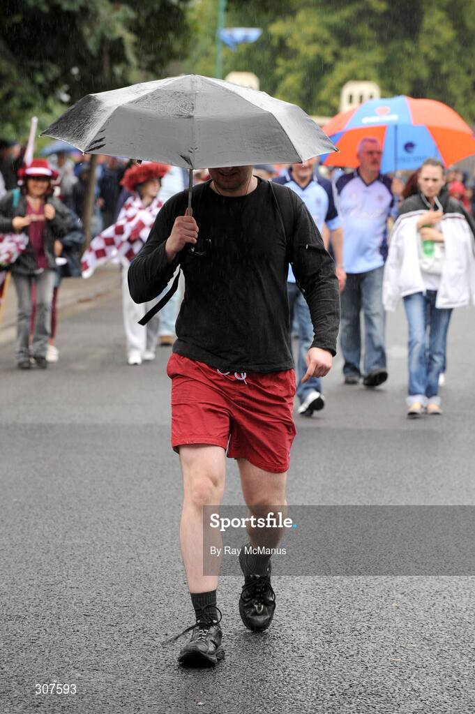 29 June 2008; A supporter makes his way down Jones Road on the way to the game. GAA Football Leinster Senior Championship Semi-Final, Dublin v Westmeath, Croke Park, Dublin. Picture credit: Ray McManus / SPORTSFILE