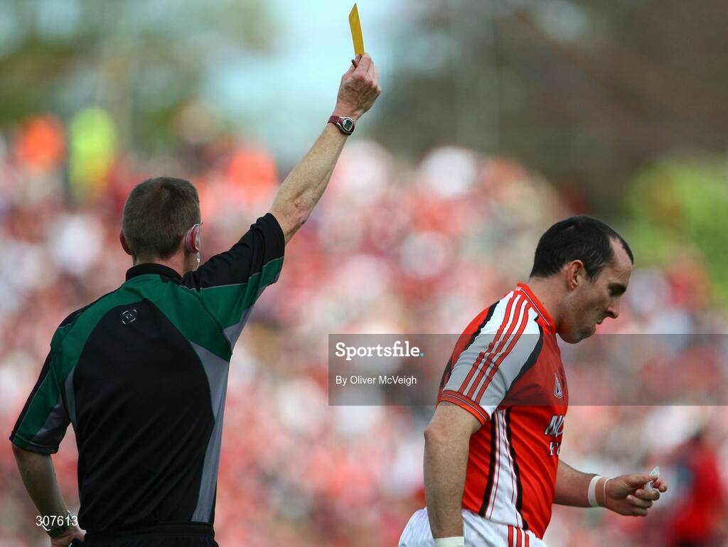 29 June 2008; Martin O'Rourke, Armagh, receives a yellow card from Referee Joe McQuillan. GAA Football Ulster Senior Championship Semi-Final, Down v Armagh, St Tighearnach's Park, Clones, Co. Monaghan. Picture credit: Oliver McVeigh / SPORTSFILE