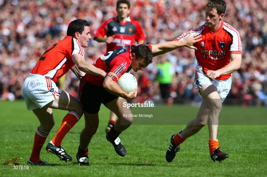 29 June 2008; Daniel Hughes, Down, in action against Andy Mallon and Finnian Moriarty, Armagh. GAA Football Ulster Senior Championship Semi-Final, Down v Armagh, St Tighearnach's Park, Clones, Co. Monaghan. Picture credit: Oliver McVeigh / SPORTSFILE