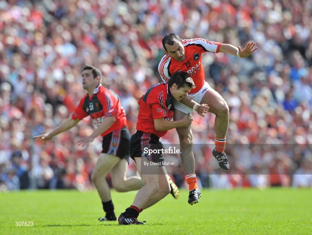 29 June 2008; Martin O'Rourke, Armagh, clashes with Damien Rafferty, Down, resulting with referee Joe McQuillan sending off Martin O'Rourke, Armagh. GAA Football Ulster Senior Championship Semi-Final, Down v Armagh, St Tighearnach's Park, Clones, Co. Monaghan. Picture credit: David Maher / SPORTSFILE