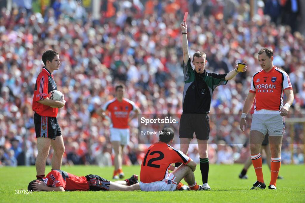 29 June 2008; Referee Joe McQuillan, shows the red card to Martin O'Rourke, no.12, Armagh for a challange on Damien Rafferty, Down. GAA Football Ulster Senior Championship Semi-Final, Down v Armagh, St Tighearnach's Park, Clones, Co. Monaghan. Picture credit: David Maher / SPORTSFILE
