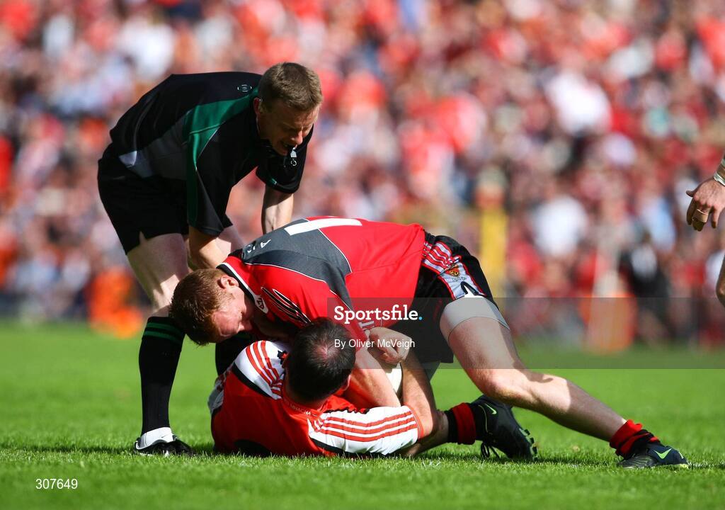 29 June 2008; Benny Coulter, Down, trying to wrestle the ball from Aidan O'Rourke, Armagh. GAA Football Ulster Senior Championship Semi-Final, Down v Armagh, St Tighearnach's Park, Clones, Co. Monaghan. Picture credit: Oliver McVeigh / SPORTSFILE