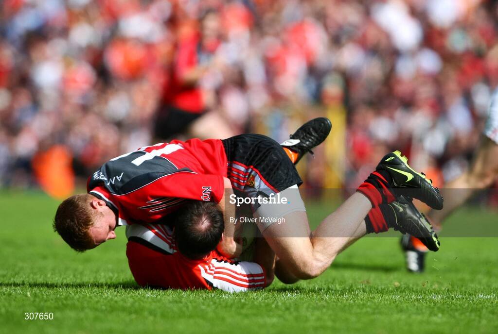29 June 2008; Benny Coulter, Down, trying to wrestle the ball from Aidan O'Rourke, Armagh. GAA Football Ulster Senior Championship Semi-Final, Down v Armagh, St Tighearnach's Park, Clones, Co. Monaghan. Picture credit: Oliver McVeigh / SPORTSFILE
