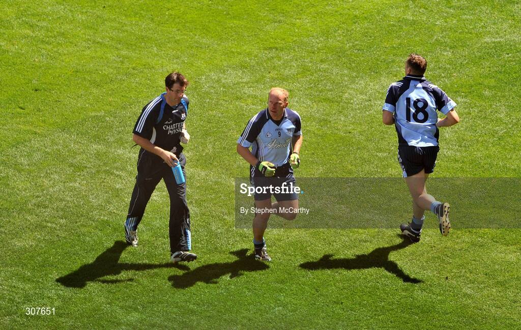 29 June 2008; Ciaran Whelan, Dublin, makes his way onto the pitch to replace Shane Ryan, left, who is accompanied by Dublin Physio John Murphy. GAA Football Leinster Senior Championship Semi-Final, Dublin v Westmeath, Croke Park, Dublin. Picture credit: Stephen McCarthy / SPORTSFILE
