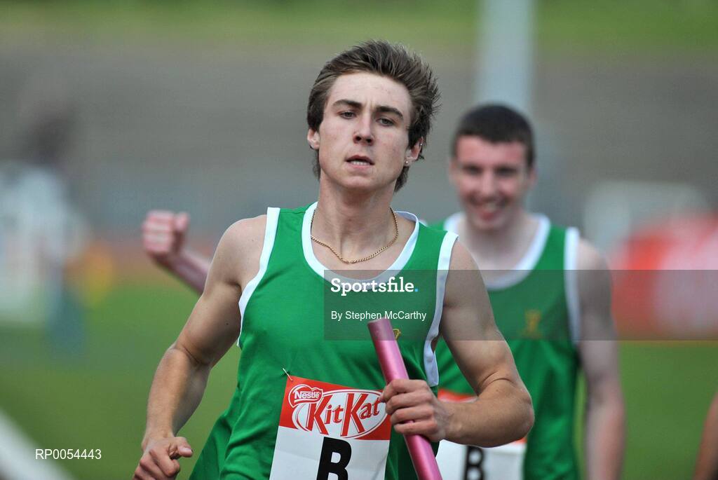 28 June 2008; Joseph Dowling crosses the line to win the Boys 4x400m Boys relay for Leinster as Feilibh Duffy celebrates at the KitKat Tailteann inter provincial track & field final. Morton Stadium, Santry, Dublin. Picture credit: Stephen McCarthy / SPORTSFILE