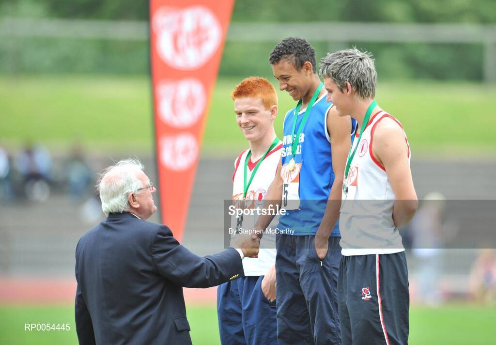 28 June 2008; Winner of the Boys 1500m Steeplechase Cathal O'Connor, St. Caimins Community School, Shannon, Co. Clare, is congratulated by President of the Irish Schools Athletics Association Michael Hunt as second place Pauric McLaughlin, St. Eunan's College, Letterkenny, Co. Donegal, right, and Daniel Crangle, St. Malachy's Belfast, Co. Antrim, watch on at the KitKat Tailteann inter provincial track & field final. Morton Stadium, Santry, Dublin. Picture credit: Stephen McCarthy / SPORTSFILE