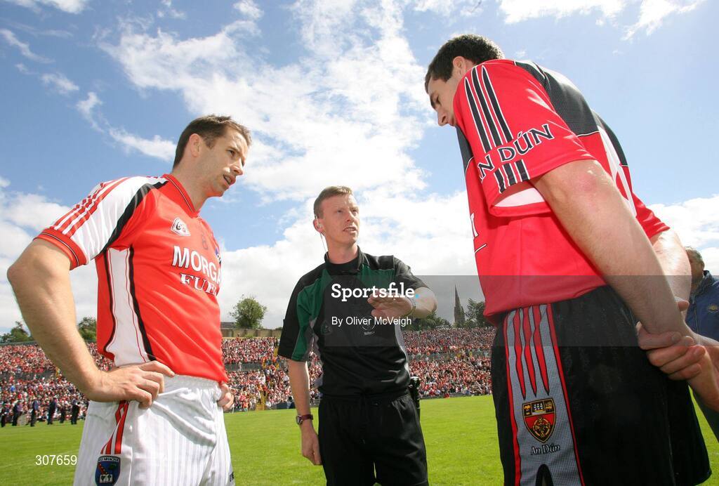 29 June 2008; Referee Joe McQuillan tosses the coin with Armagh captain Paul McGrane and Down captain Dan Gordon. GAA Football Ulster Senior Championship Semi-Final, Down v Armagh, St Tighearnach's Park, Clones, Co. Monaghan. Picture credit: Oliver McVeigh / SPORTSFILE