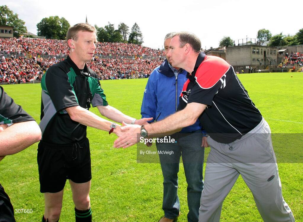 29 June 2008; Down Manager Ross Carr, right, shakes hands with Referee Joe McQuillan before the game. GAA Football Ulster Senior Championship Semi-Final, Down v Armagh, St Tighearnach's Park, Clones, Co. Monaghan. Picture credit: Oliver McVeigh / SPORTSFILE