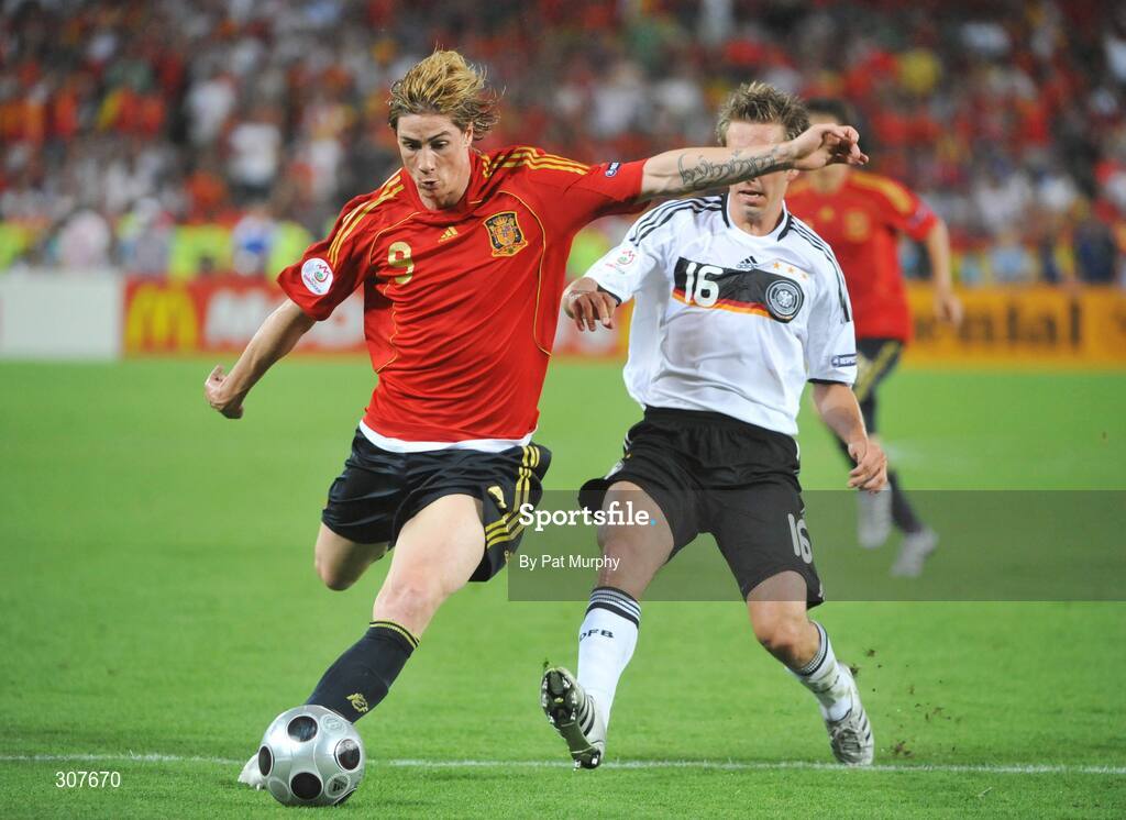 29 June 2008; Fernando Torres, Spain, goes past Germany's Philipp Lahm on his way to scoring his side's first goal. UEFA EURO 2008TM, Final, Germany v Spain, Ernst Happel Stadion, Vienna, Austria. Picture credit; Pat Murphy / SPORTSFILE