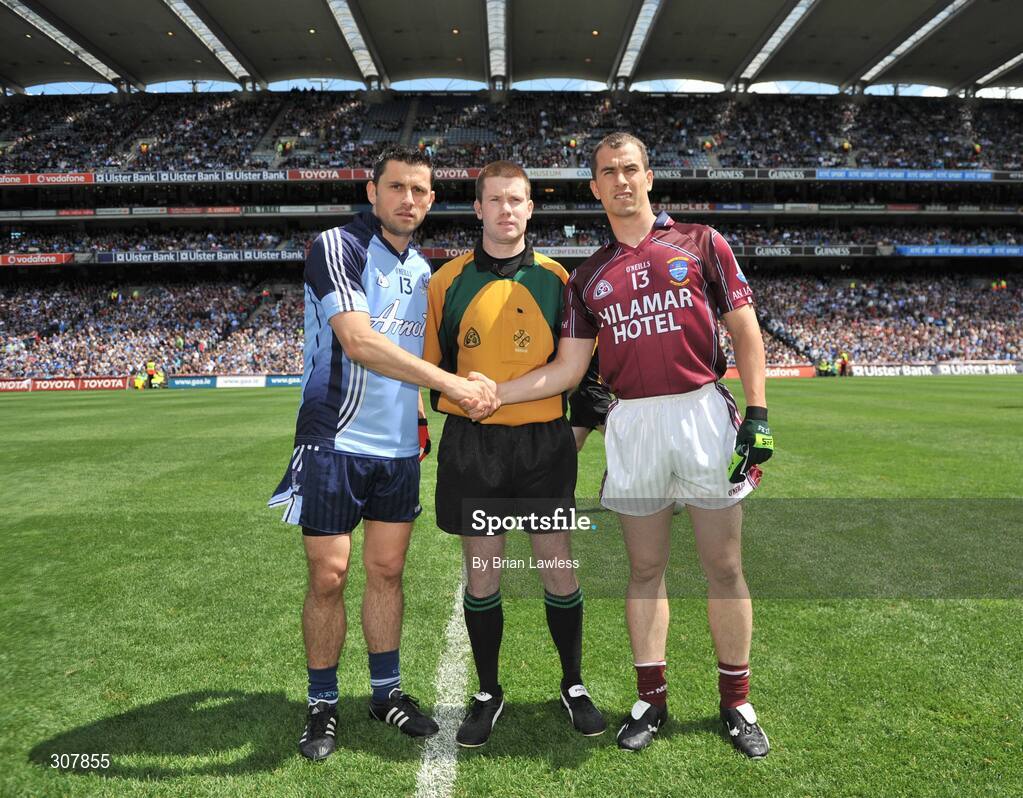 29 June 2008; Captains Des Dolan, Westmeath, and Alan Brogan, Dublin, shake hands in the company of referee Padraig Hughes. GAA Football Leinster Senior Championship Semi-Final, Dublin v Westmeath, Croke Park, Dublin. Picture credit: Brian Lawless / SPORTSFILE