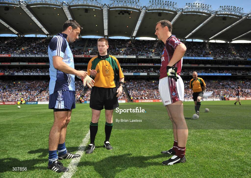29 June 2008; Referee Padraig Hughes tosses the coin as captains Des Dolan, Westmeath, and Alan Brogan, Dublin, look on. GAA Football Leinster Senior Championship Semi-Final, Dublin v Westmeath, Croke Park, Dublin. Picture credit: Brian Lawless / SPORTSFILE