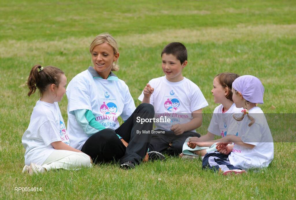 2 July 2008; Irish 3000m runner Roisin McGettigan with, from left, Lia Brady, 9, Cian May, 7, Ellie Brady, 6, and Caoimhe May, 5, at the Launch of Athletics Ireland Family Fitness Festival. Farmleigh, Phoenix Park, Dublin. For more information visit www.familyfitnessfestival.ie. Picture credit: Matt Browne / SPORTSFILE