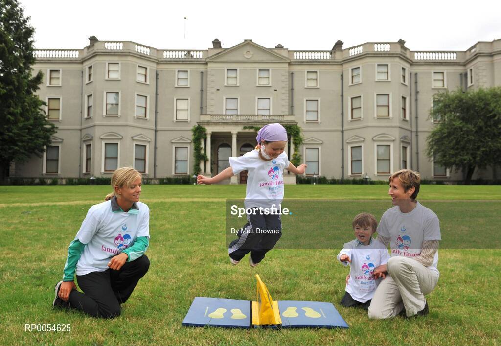 2 July 2008; Caoimhe May, Age 5, on a jump mat watched by former Olympic Runner Catherina McKiernan with her son Patrick, Age 2, and Irish 3000m runner Roisin McGettigan at the Launch of Athletics Ireland Family Fitness Festival. Farmleigh, Phoenix Park, Dublin. For more information visit www.familyfitnessfestival.ie. Picture credit: Matt Browne / SPORTSFILE